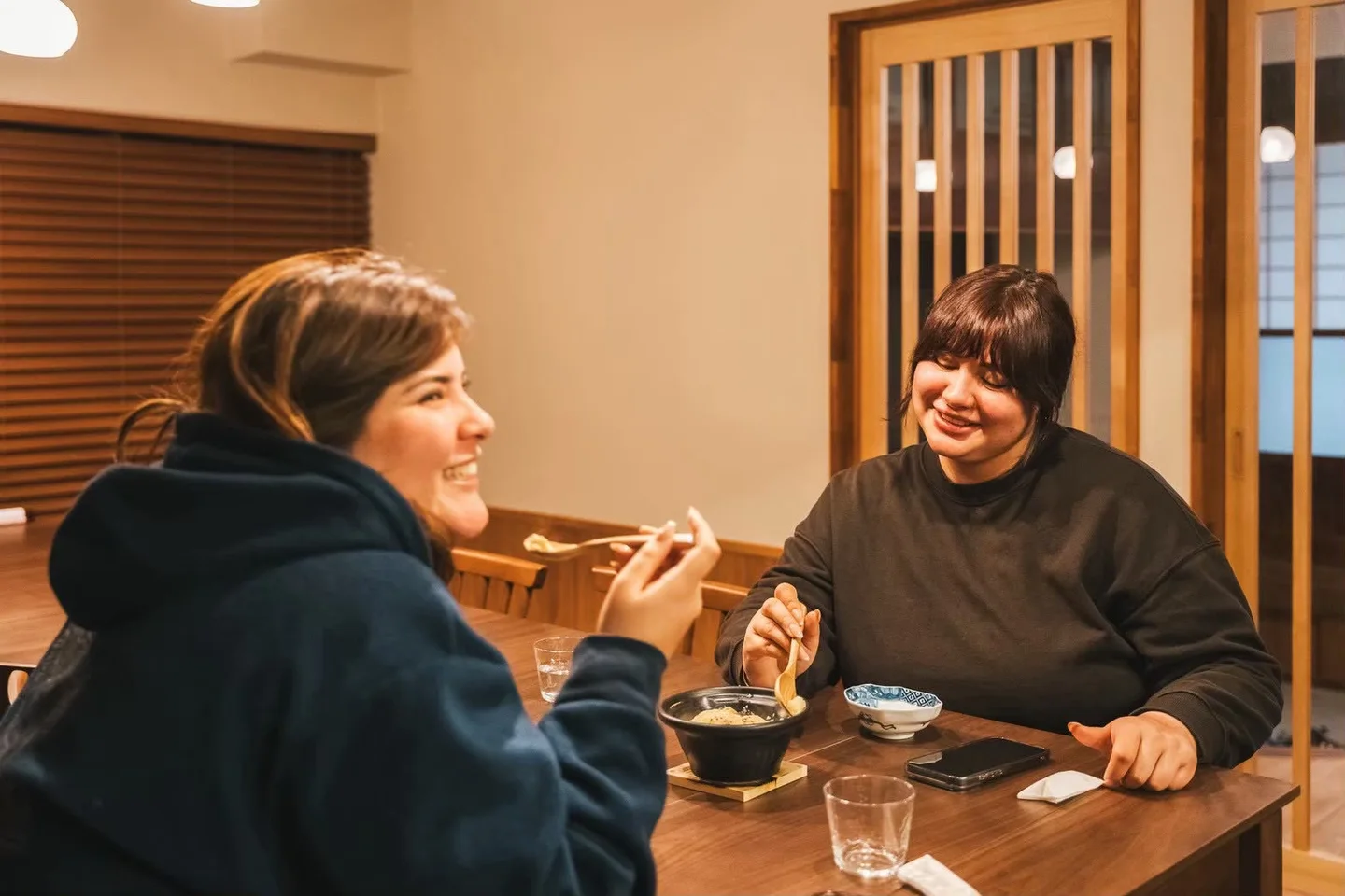 Guests sharing a meal in the private dining room at Fukuwatari Tei